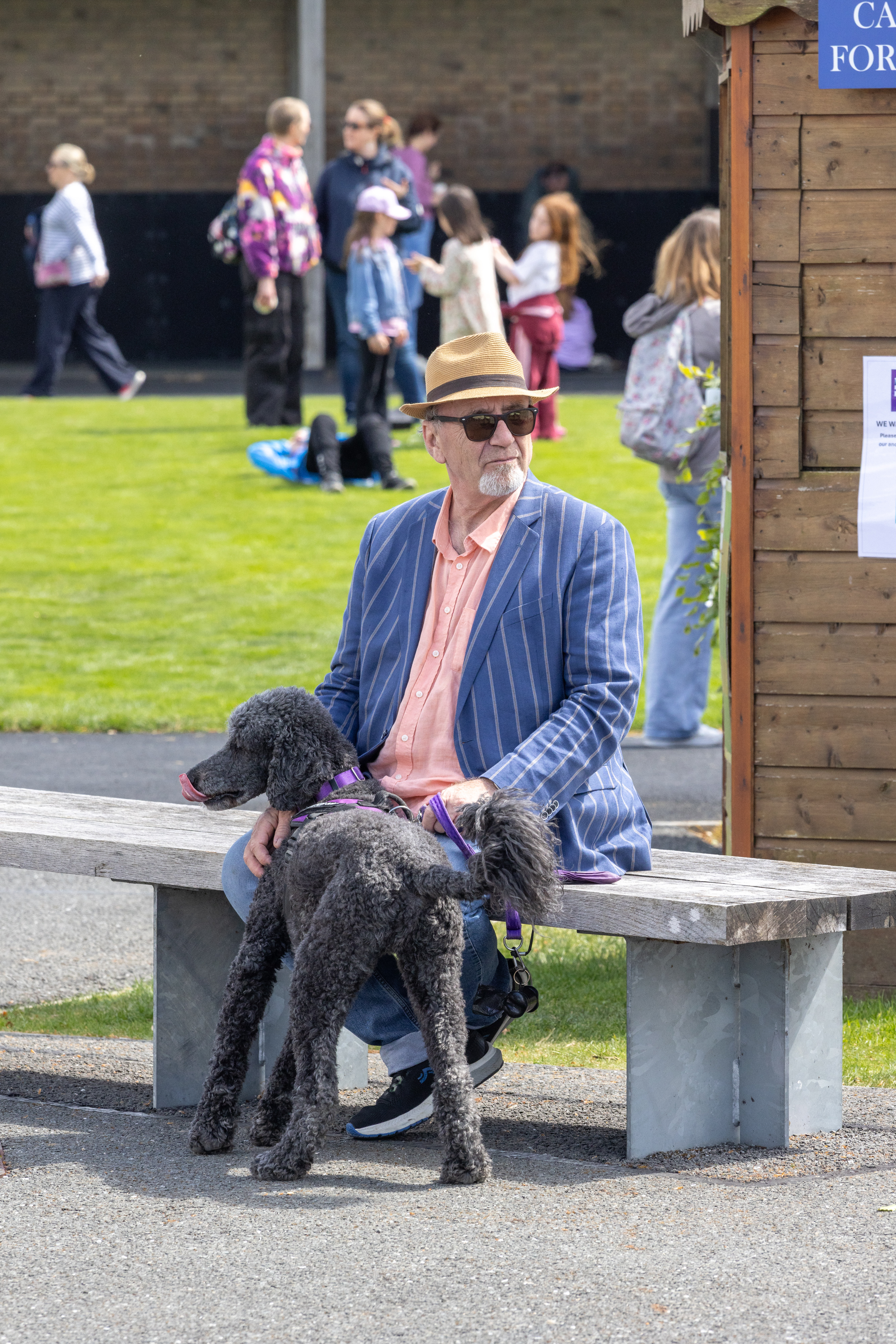 Person sat with their dog. 
